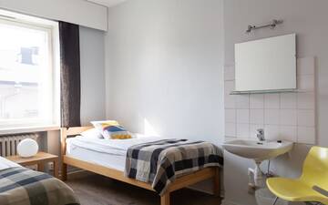Фото номера Двухместный номер с 2 отдельными кроватями Хостелы Hostel Buisto г. Пори 3