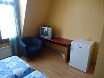 Фото номера Двухместный номер с 2 отдельными кроватями Отель Mäntyluodon Hotelli г. Пори 12