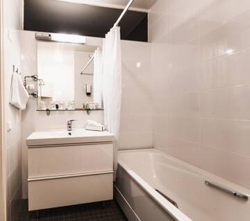 Фото номера Семейный номер (для 2 взрослых и 2 детей) Отель Yyteri Spa Hotel г. Пори 3