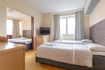 Фото номера Семейный номер с сауной Отель Torget Aparthotel г. Пори 2