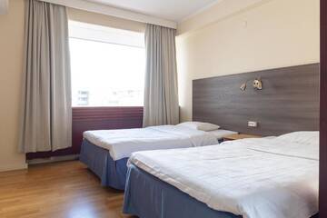 Фото номера Семейный номер с сауной Отель Torget Aparthotel г. Пори 3