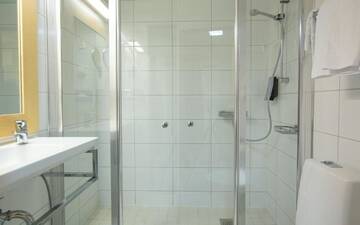 Фото номера Двухместный номер «Комфорт» с 2 отдельными кроватями Отель Torget Aparthotel г. Пори 3