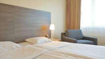 Фото номера Двухместный номер с 1 кроватью и креслом Отель Torget Aparthotel г. Пори 2